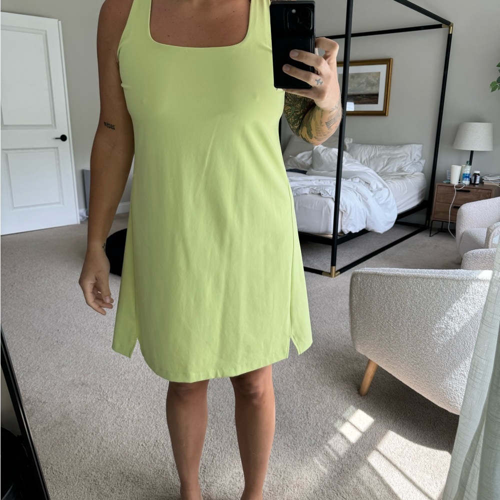 Yellow dress with built in bra and shorts with pocket